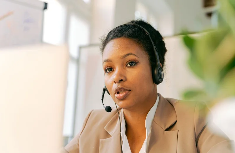 Technical support engineer assisting a client with hosting